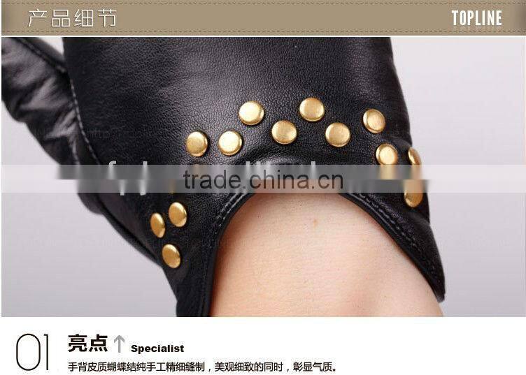 women wearing black and wet blue fashion leather driving gloves