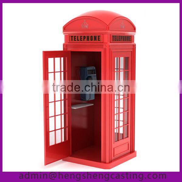 Red kiosk with telephone for UK client, telephone kiosk
