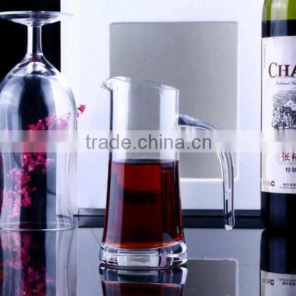 Hand blown glass jar with handle