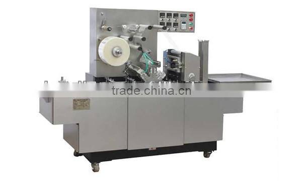 Automatic cellophane overwrapping machine