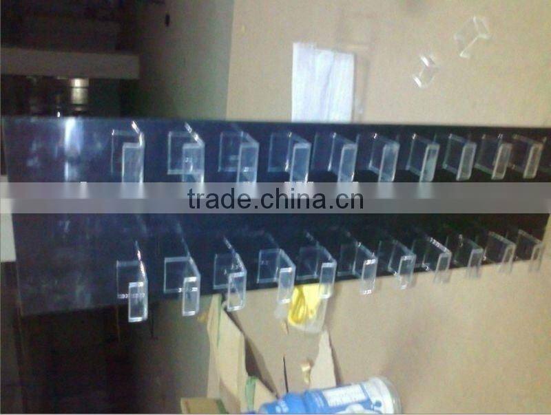 Organic glass display shelf for small adorn article