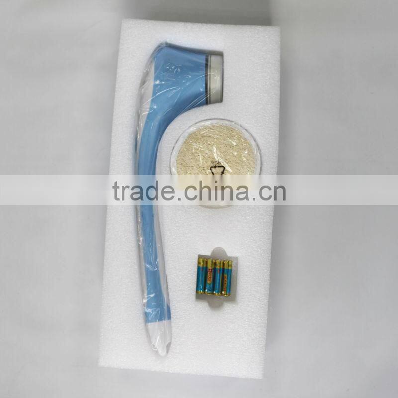 Body massaging brush