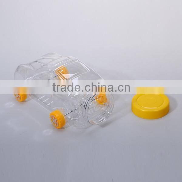 Small cute clear plastic bottles in toy shaped for candy