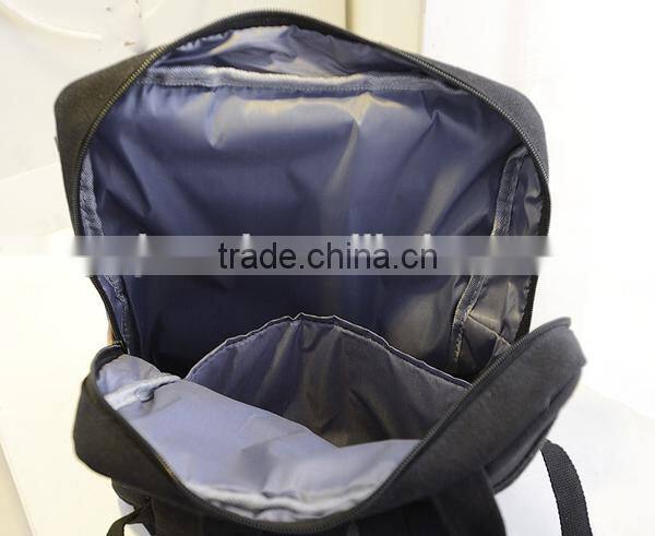blue canvas travel backpack with laptop compartment