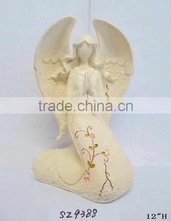 Resin fairy with a snail statue sculpture