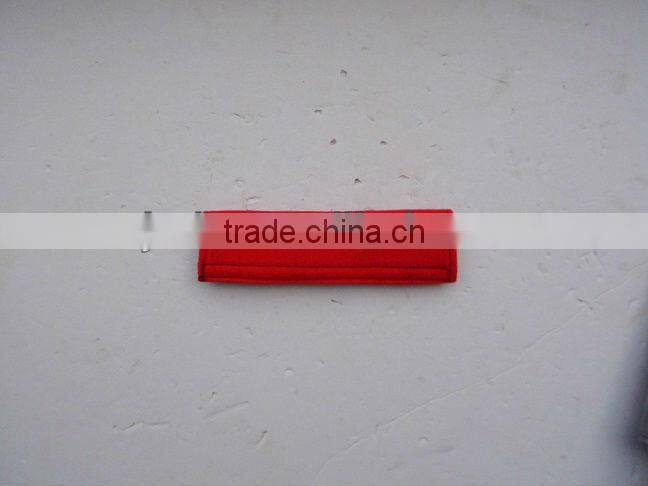 Red seat belt cover