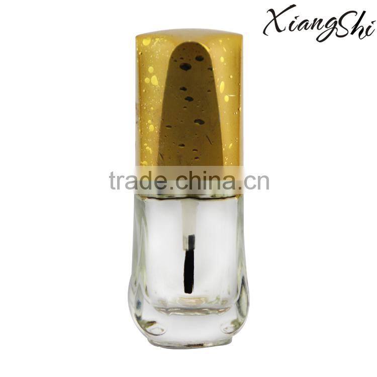 brown/clear glass gel nail polish bottle with different caps