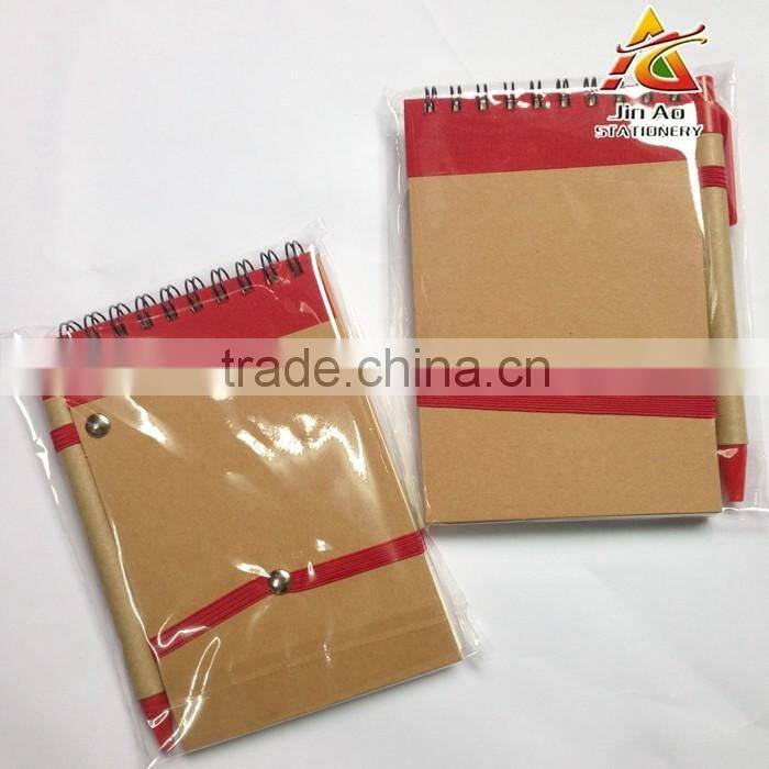 craft paper notebook with pen