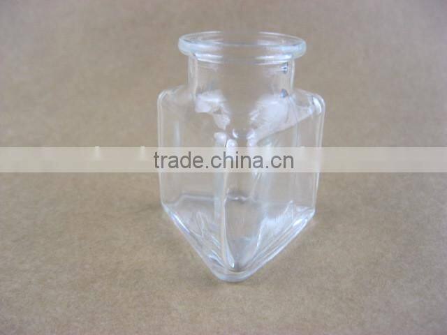 triangle shaped glass storage jar