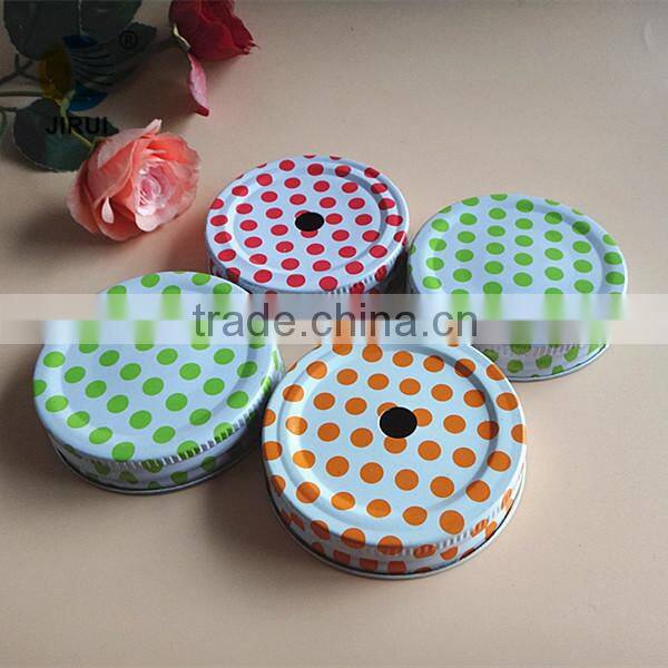 blue colour metal screw cap with white knots