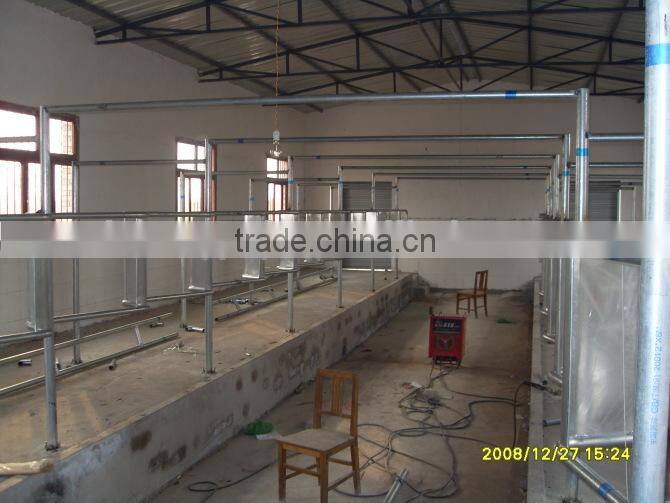 Milking Machine System with Automatic Cluster Remover