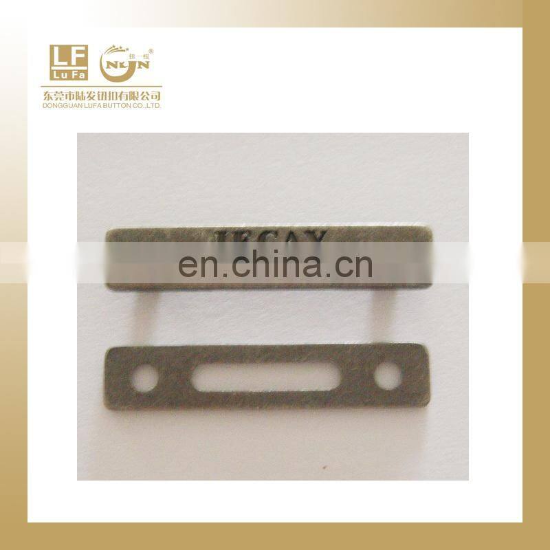 metal brand LOGO plate with 2 foldable legs at back for hangbags