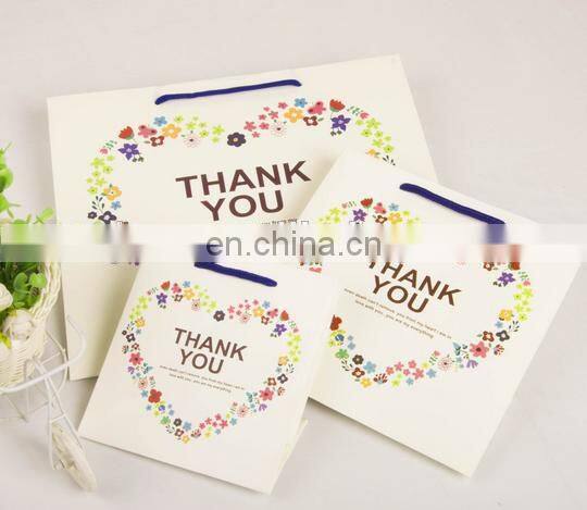 2015 cost production cookies packing paper bag with hanlde for shopping
