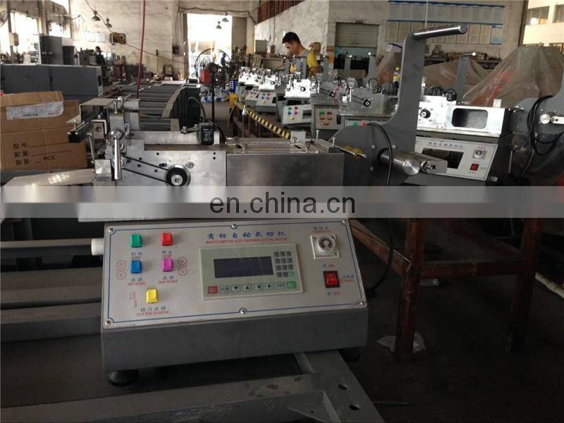UGS2050 hot cold mini table top automatic fabric woven label cutting machine, small garment wash care ribbon cutter