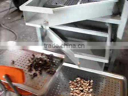Cashew shell and kernel seperating machine