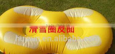 Double snow tube , snow float , skiiling