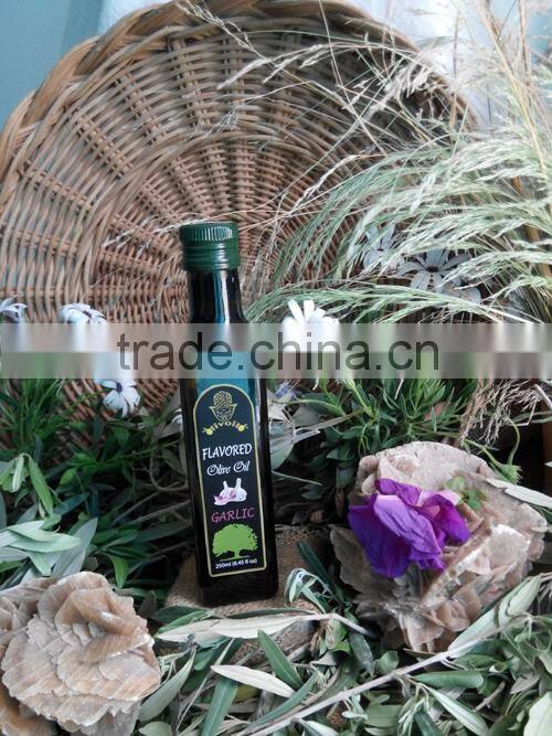 Flavored Olive Oil with Garlic. Premium Quality Olive Oil with ISO9001 Certification. Glass Bottle 250 ml.