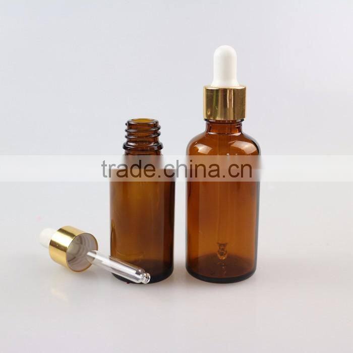Small amber glass bottle for essential oil
