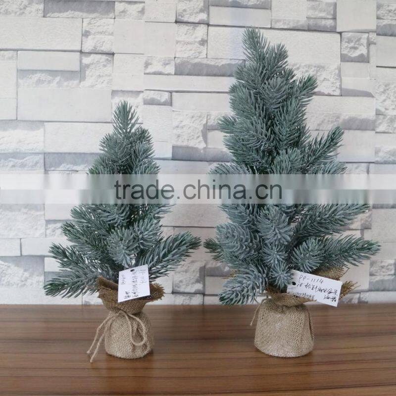 Plastic mini pine tree with burlap base for table decoration