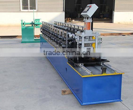 Shutter door roll forming machine