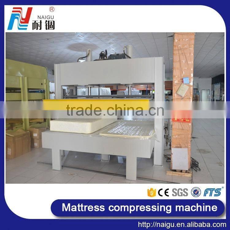 China Foshan factory price latex foam mattress compression machine/mattress roll packing machine