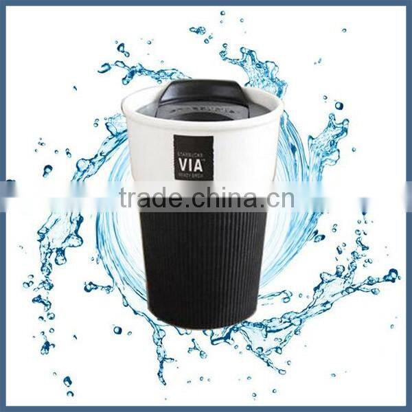 Modern simple ceramic travel coffee mug with silicone sleeve and lid