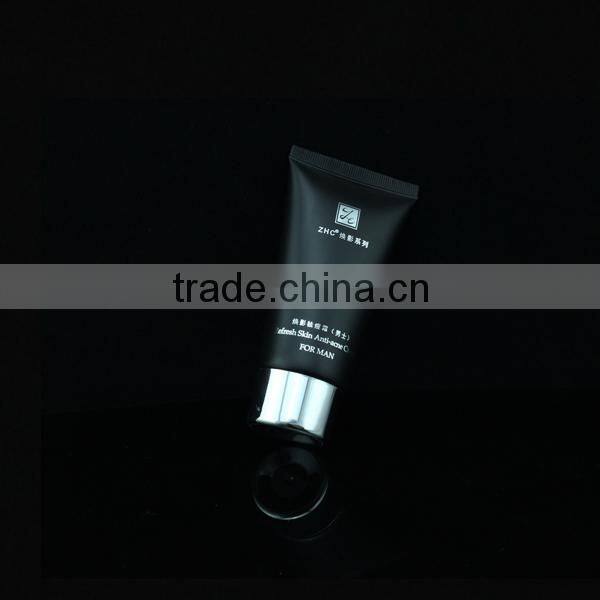 matte black cosmetic tube with slivered hot stamp