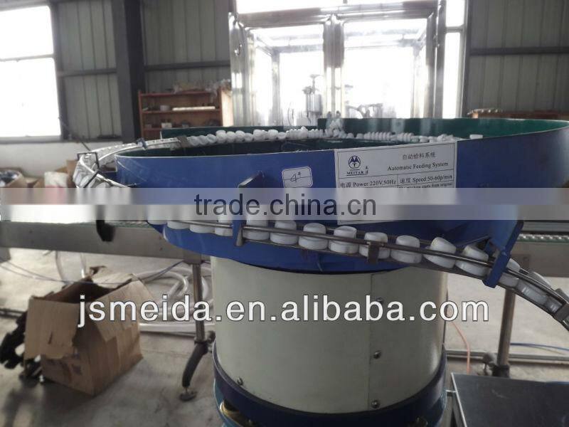 aerosol actuator placing machine