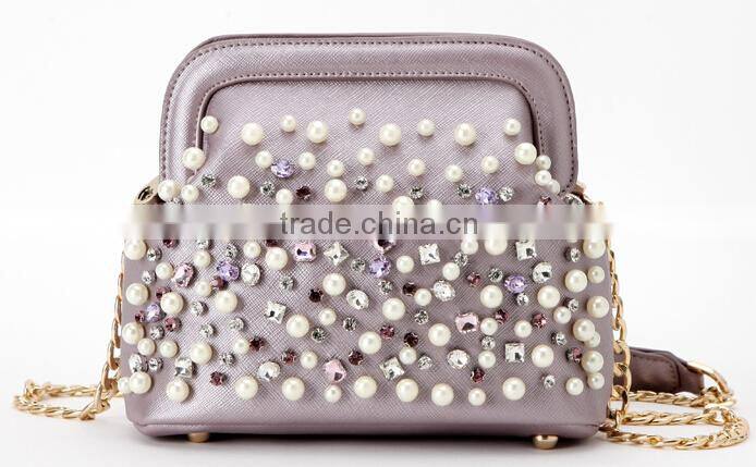 china wholesale latest fashion design decorated with pearl ladies clutch bag