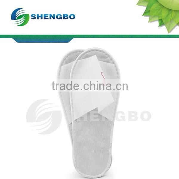 Disposable nonwoven slippers