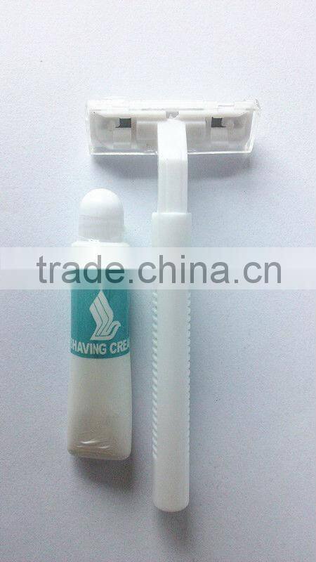 white disposable twin blade razor with 6g shaving cream
