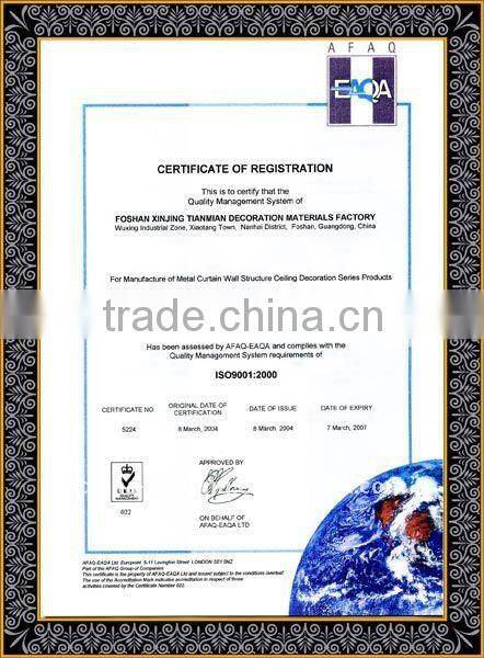 Aluminum strip ceiling tile with woodgrain color