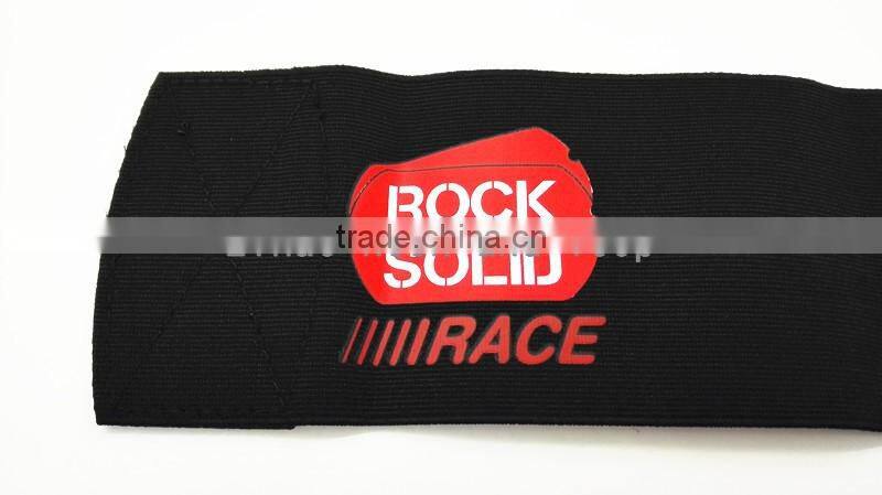 Hook and loop armband with logo