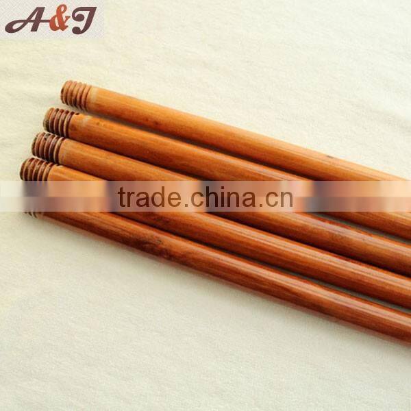Two times painted wooden screw stick for broom rake