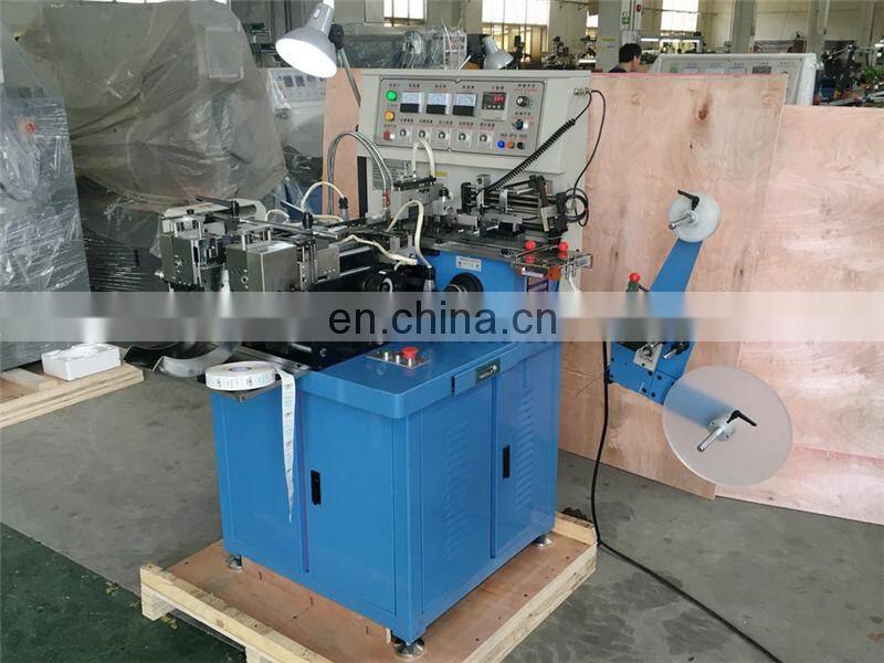 US4000 Auto hot cold knife cotton webbing ribbon garment nylon label cutting and folding machine with triangle middle fold