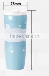 double wall insulated stainless steel vacuum thermal travel coffee mug with silicone wrap