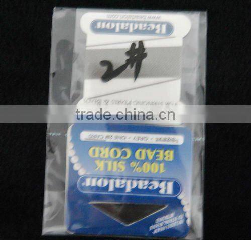 wholesale 0.7mm red 100% bead silk threading cord with needle attached