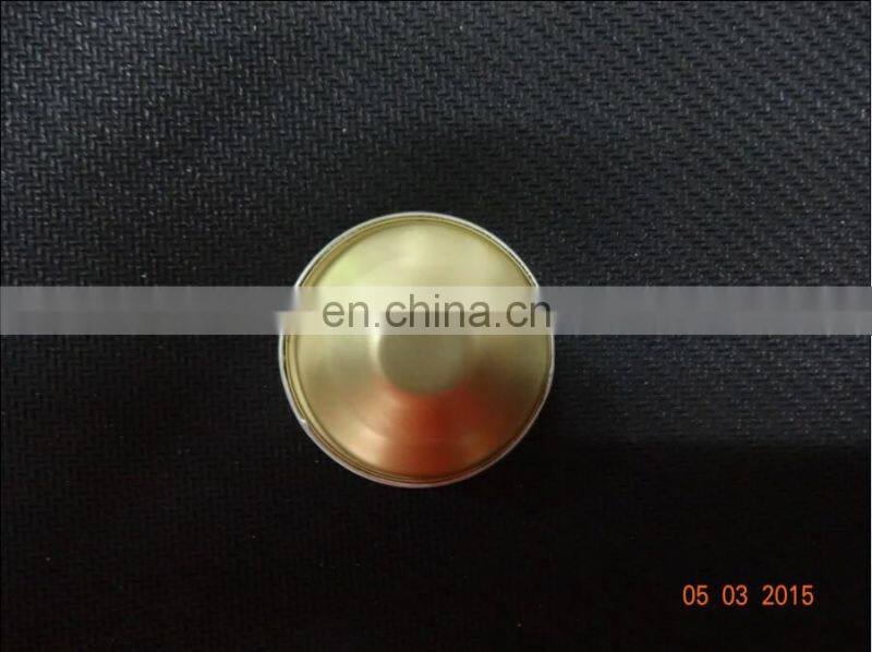 empty aluminum foil coffee capsule