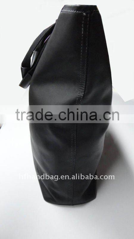 large black leather tote bag