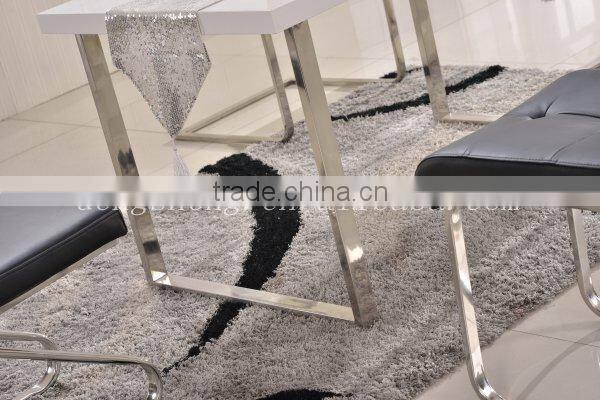 wooden dining table with stainless steel legs