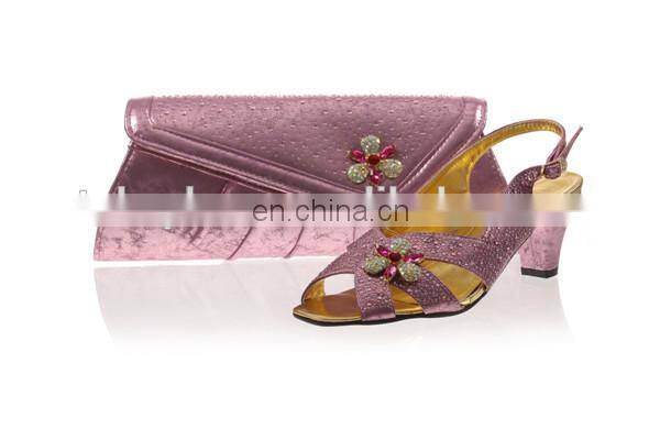 Fashion design lady wedding shoes matching bag