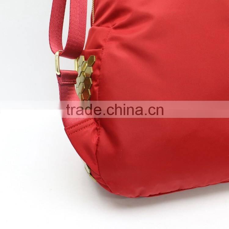 The new red embossed leather casual backpack, Wemen handbags