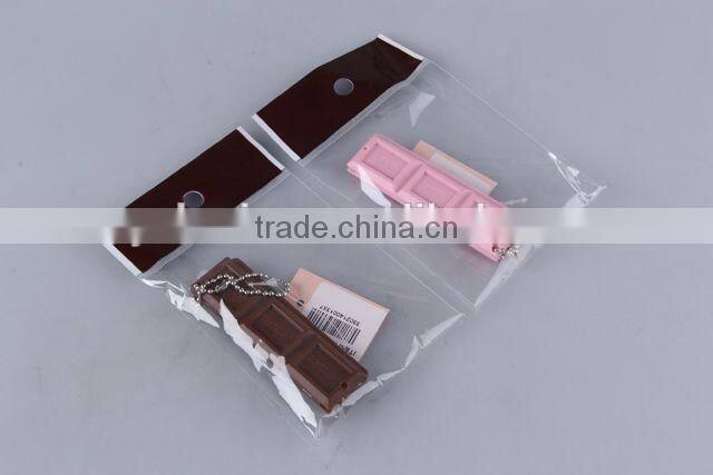 Chocolate shaped hair brush with hanging chain/folding comb