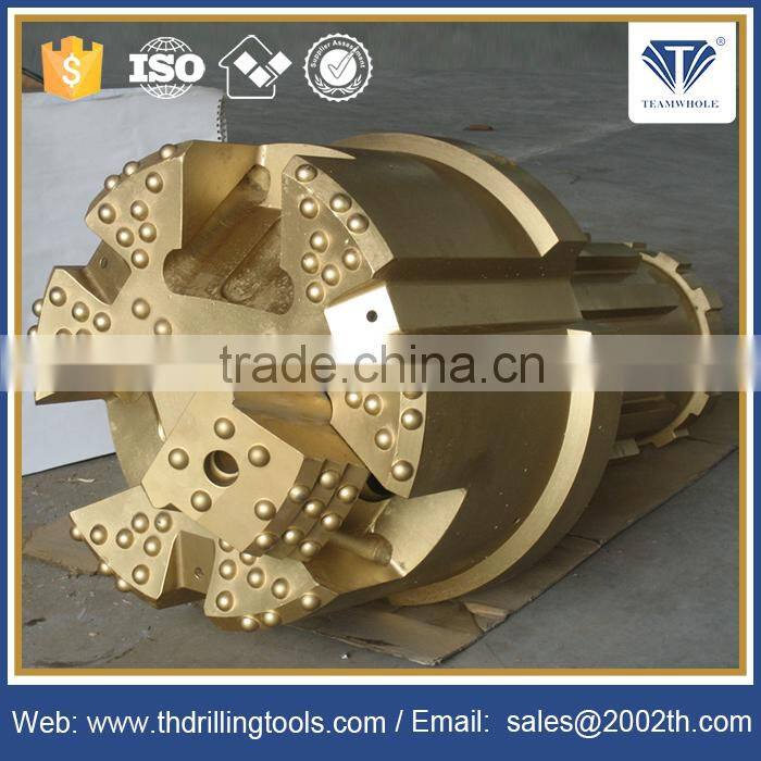 Concentric overburden drill bit with blocks for water well projcet