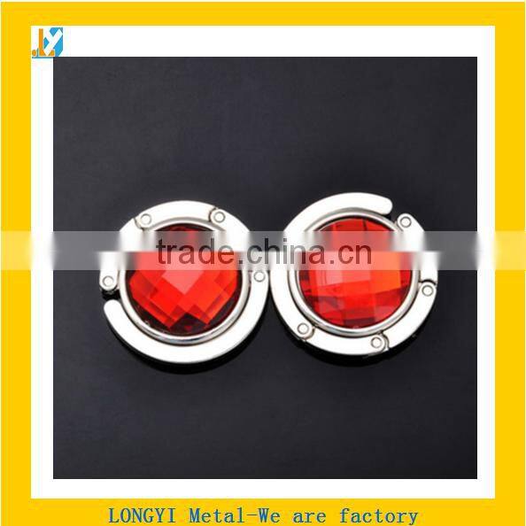 magnetic folding metal bag hanger