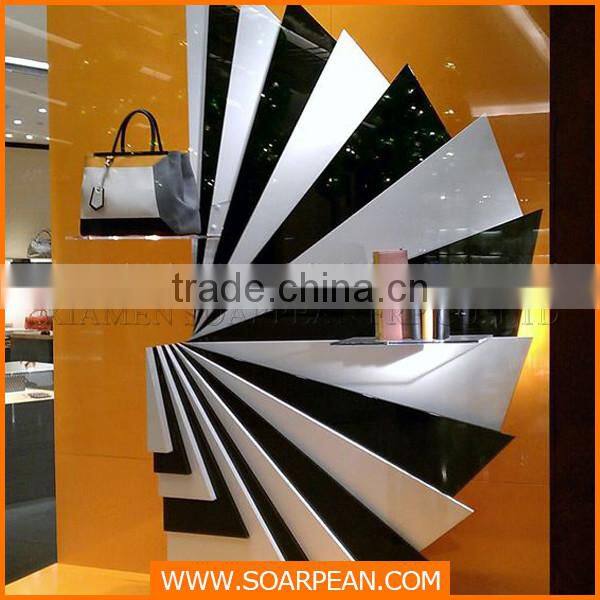 Unique visual merchandising fiberglass bag retail store display rack