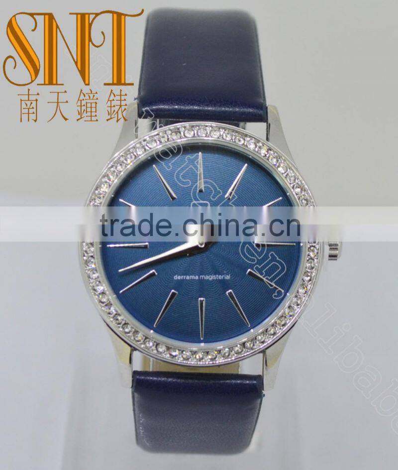 Navy texture dial with stone topring watch, smooth navy leather strap