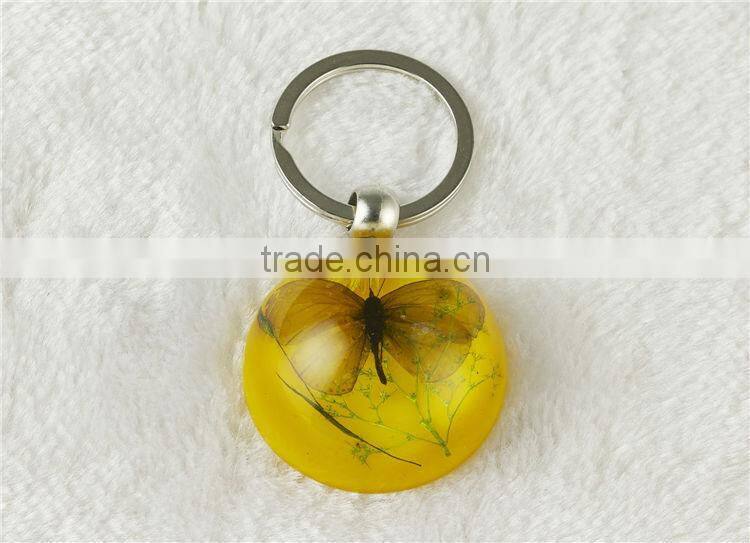 Promotional round shape butterfly and starfish fashion key chain