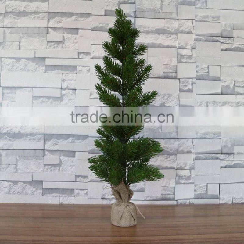Plastic mini pine tree with burlap base for table decoration