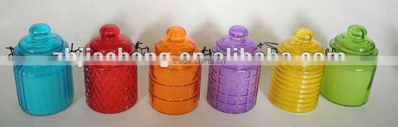 Round glass candle jar with lid and lifting handle